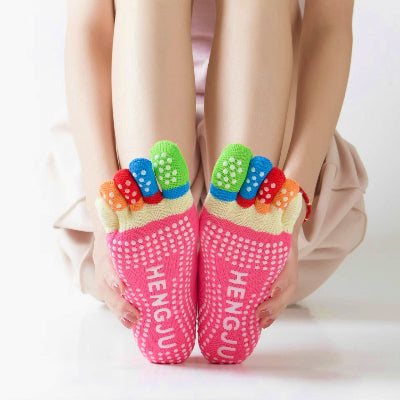 Renforcement des pieds avec des chaussettes Ă doigts.